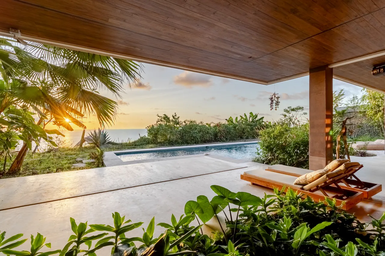 Pool and tropical planting at Villa Raya